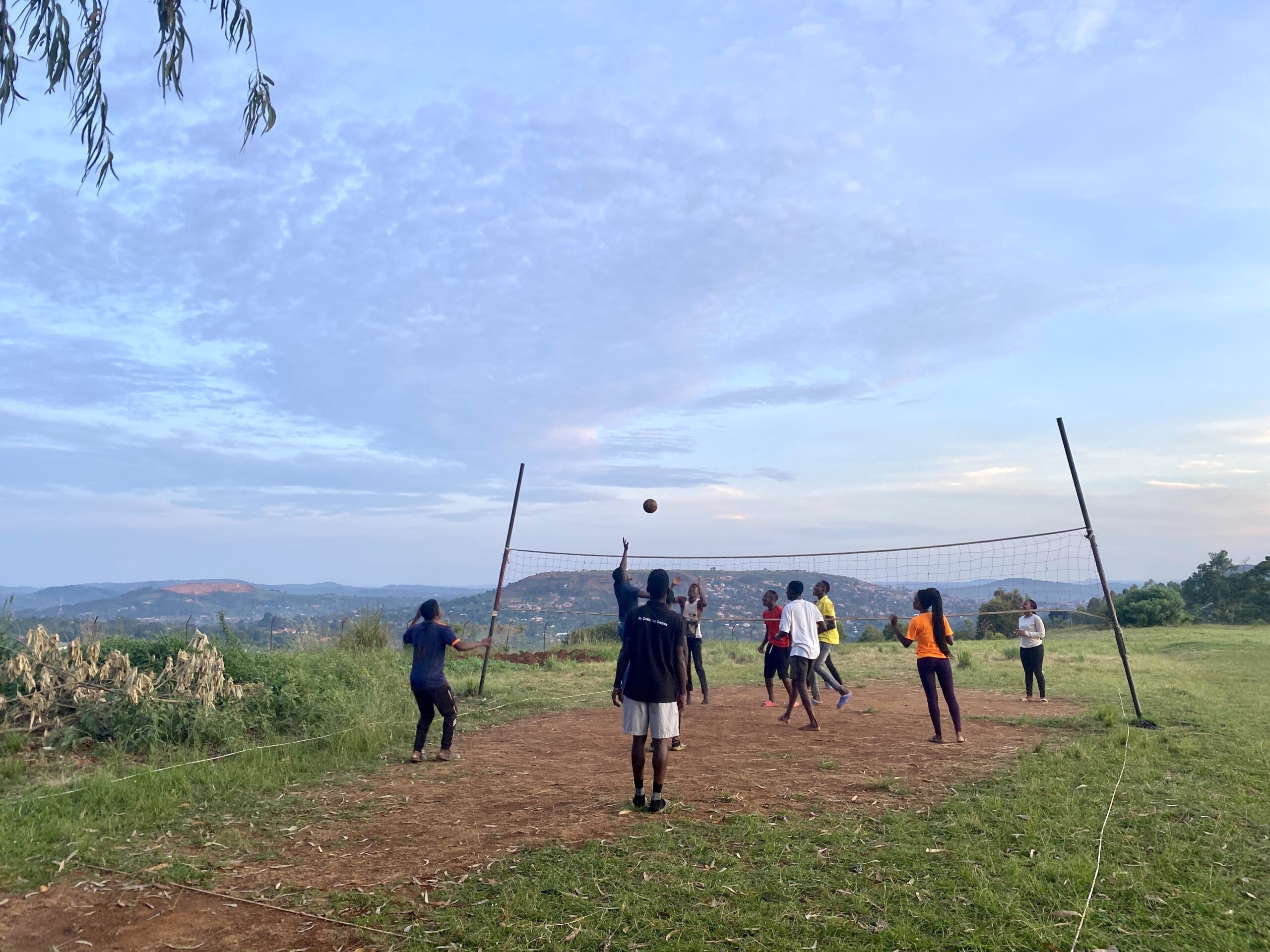 playing volleyball with views over the hills of mpigi